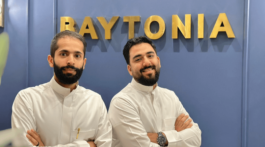 Baytonia’s two co-founders standing in front of the company name