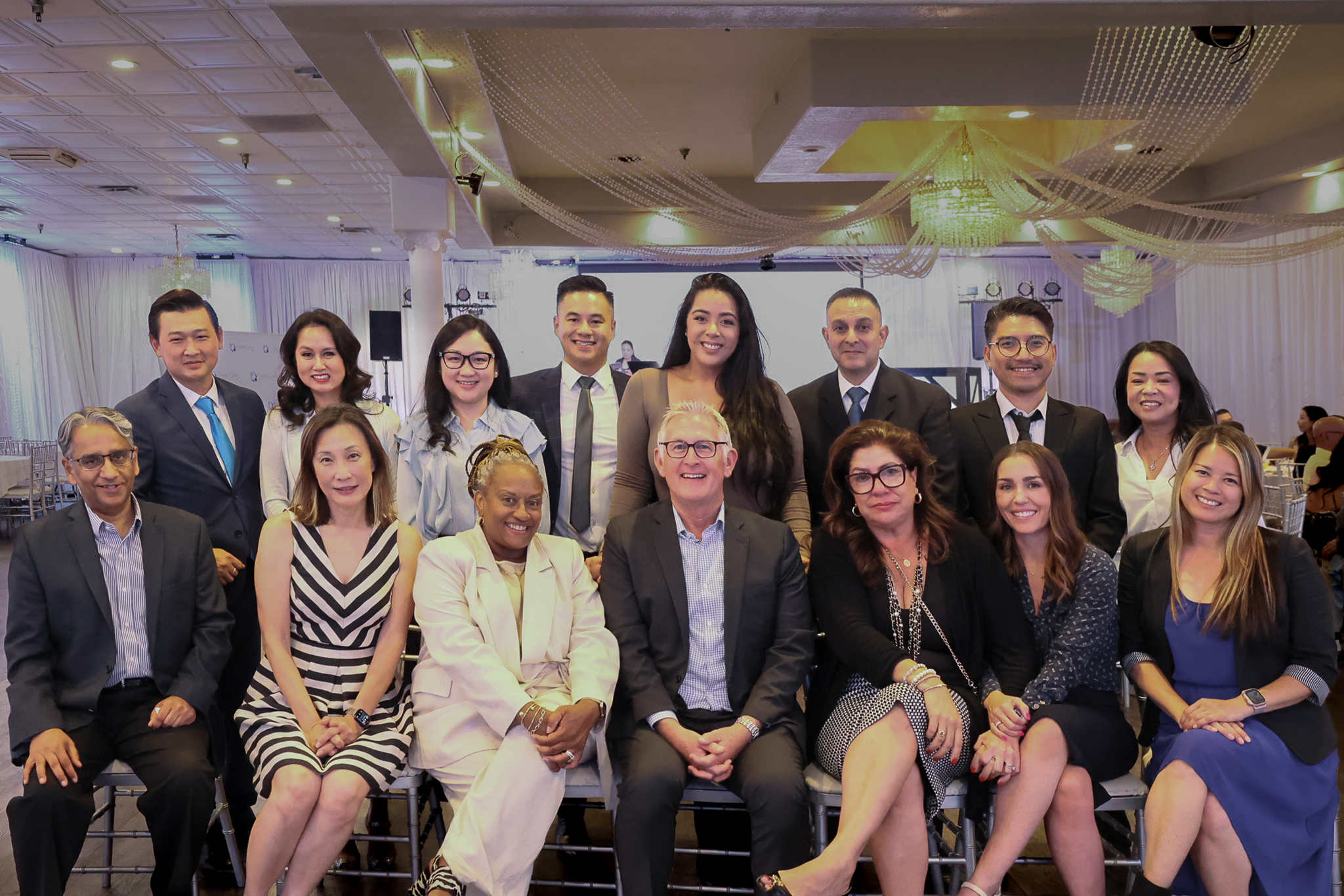 Karen Walker Johnson, seated third from left, with Clever Care colleagues at the 2024 Physicians Award Dinner