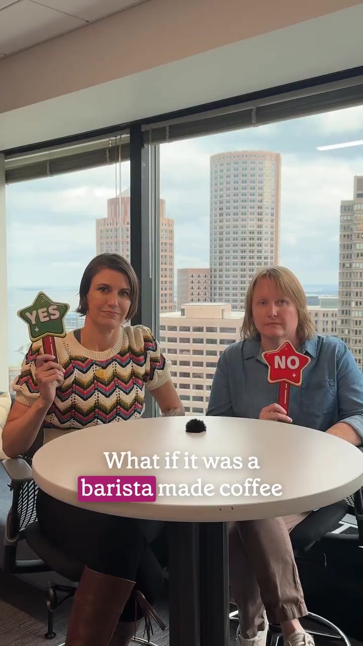 Kari Hanson speaking with Robin product leader Ciara Peter in a Boston office