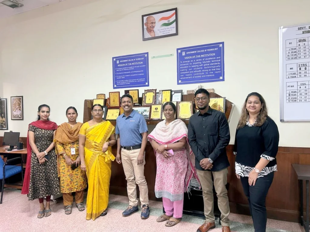 Karthik Chidambaram with DCKAP colleagues and GCT staff during the December 2025 campus visit