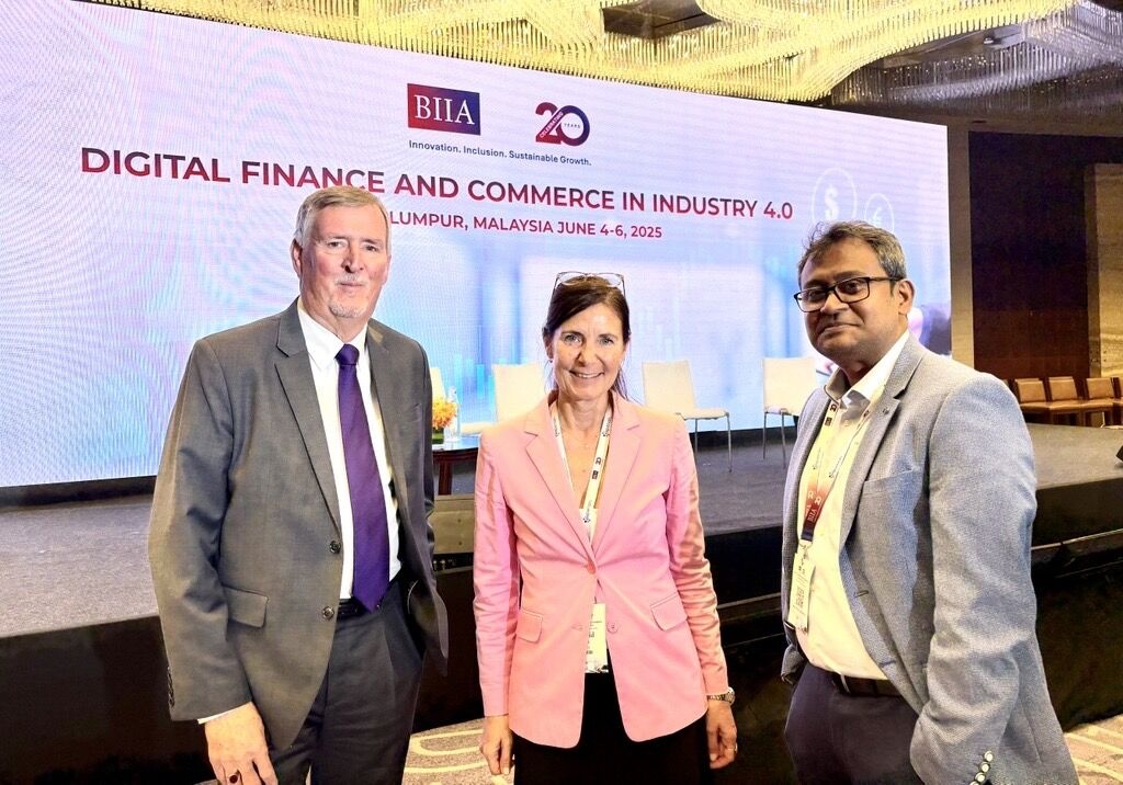 Karthik Murugian, right, with fellow attendees at the BIIA 2025 conference in Kuala Lumpur.
