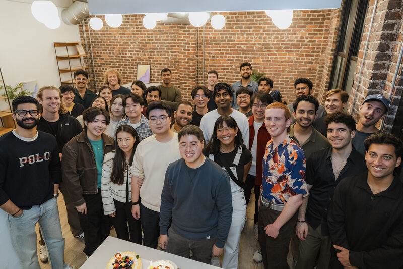 Kasey Zhang standing with colleagues and friends in Osmosis's first office in San Francisco