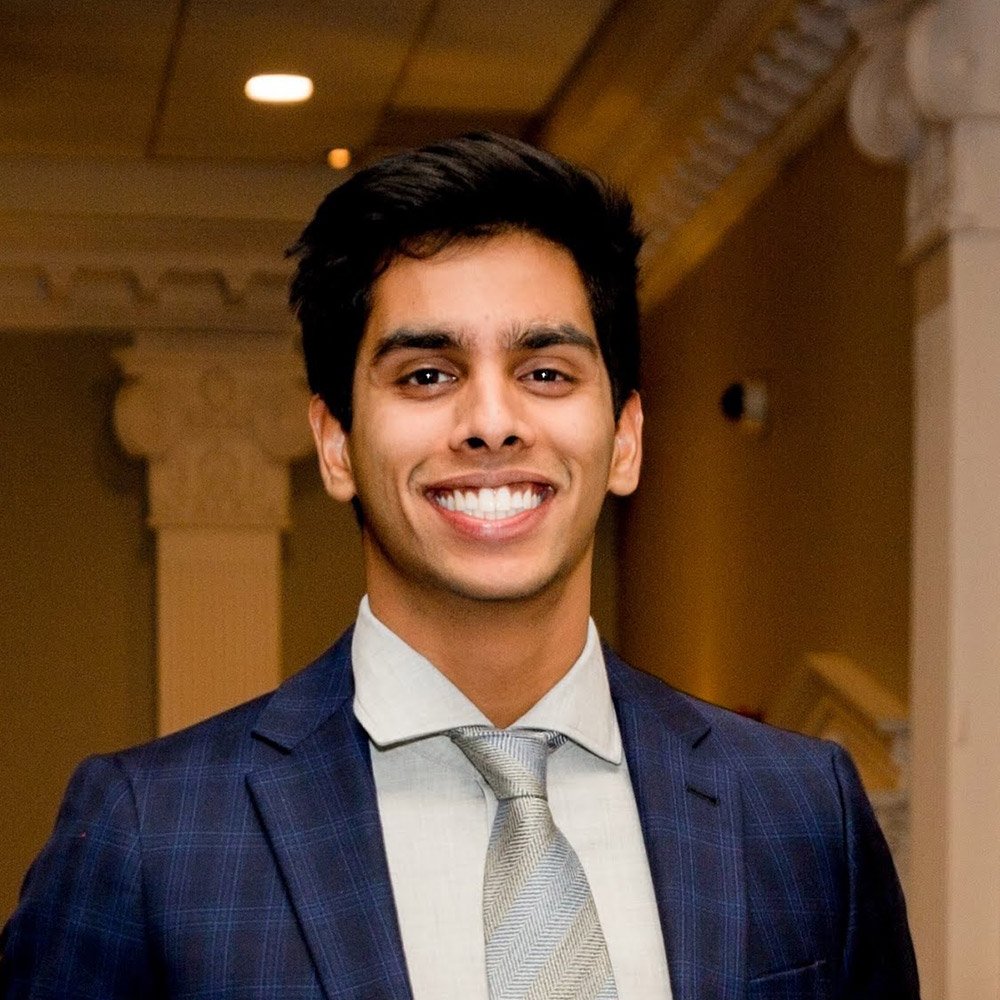 Kashyap Achar in a blue suit during his Carleton University years