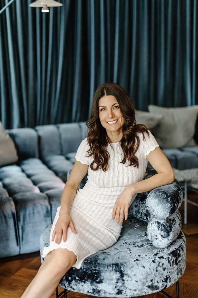 Katalyst PR founder Katherine Randall seated in a lounge