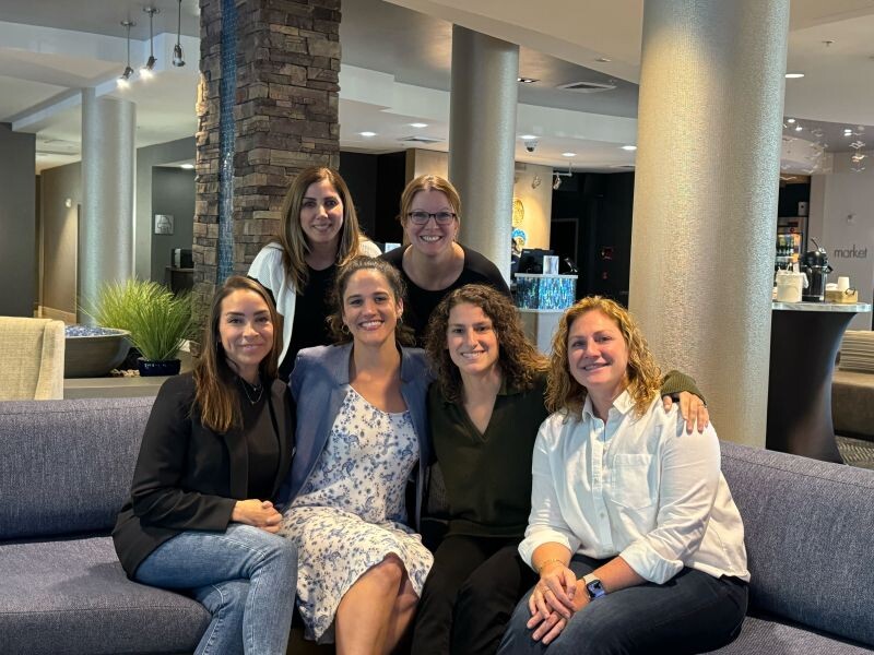 Kate Reed with women colleagues from Delinea at a company gathering