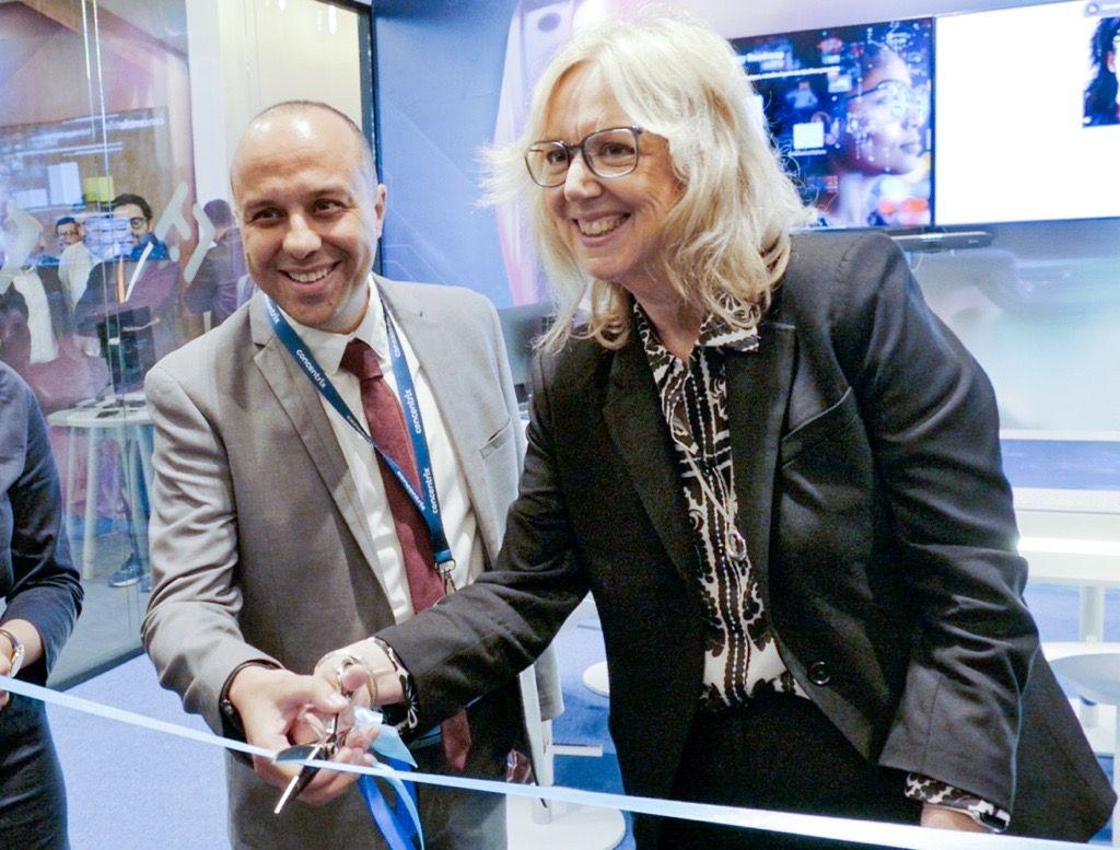 Kathy Juve cutting a ribbon during the Marrakesh Tek Lab opening