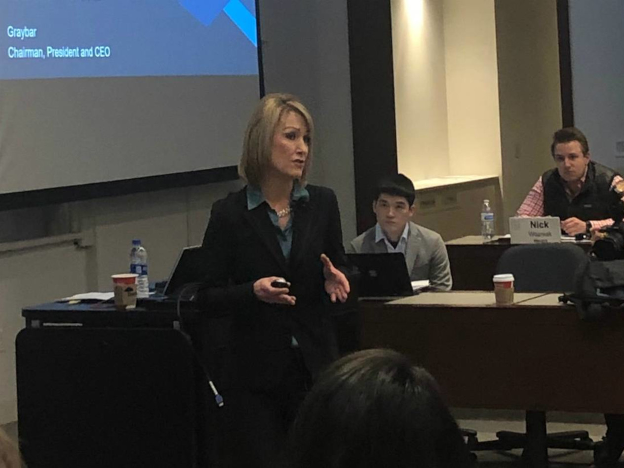 Kathy Mazzarella speaking with students in a Washington University classroom