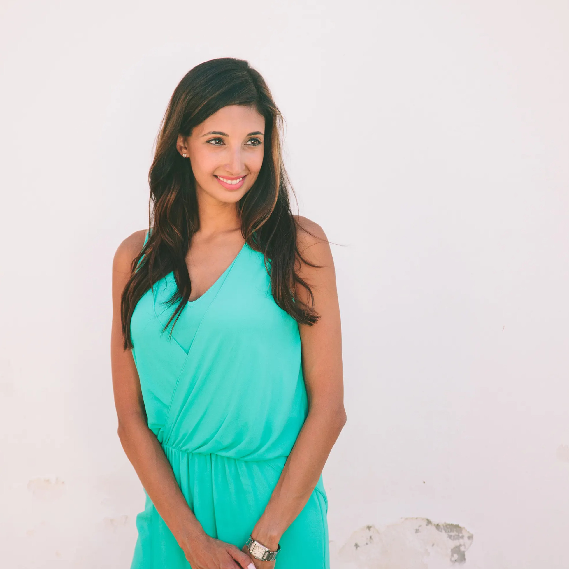 Katina Mountanos wearing a turquoise dress in Koroni, Greece