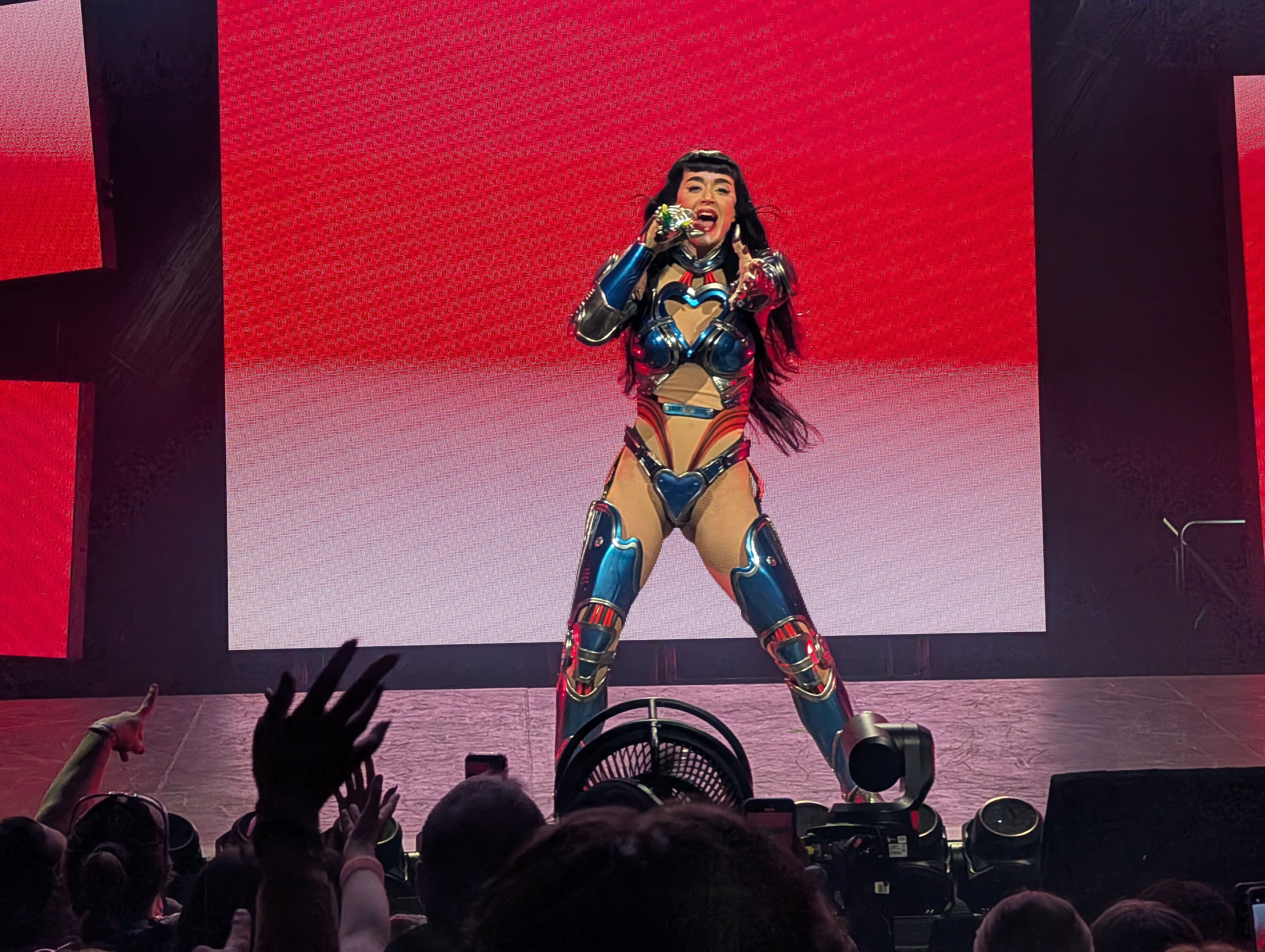 Katy Perry performing in a futuristic costume during the Lifetimes Tour in Adelaide in 2025