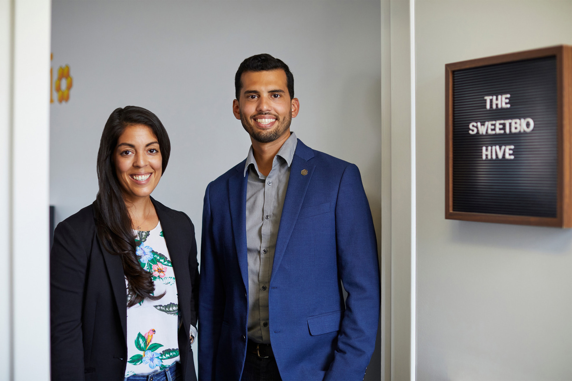 Kayla Rodriguez Graff and her brother Isaac Rodriguez standing together outside the SweetBio office