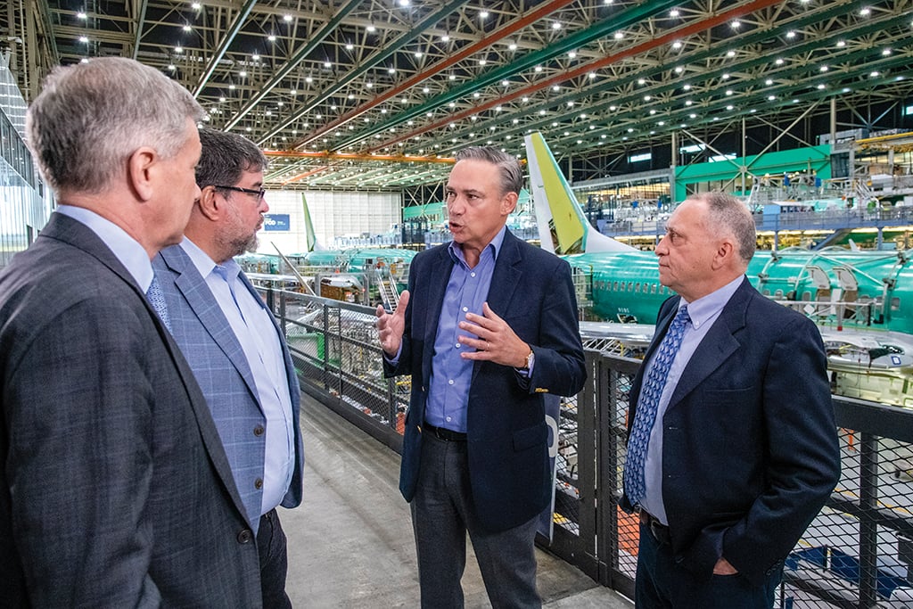 Kelly Ortberg speaking with Aviation Week editors beside the 737 MAX assembly line in Renton
