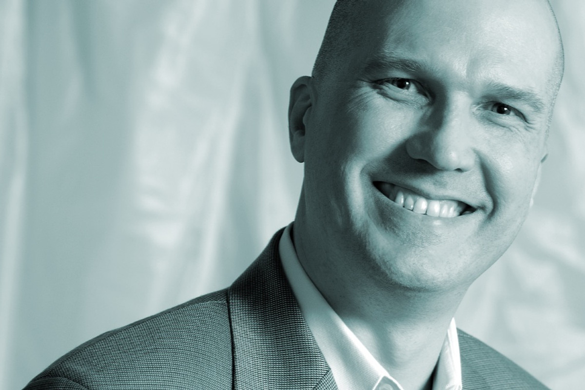 Ken Dec in a professional portrait