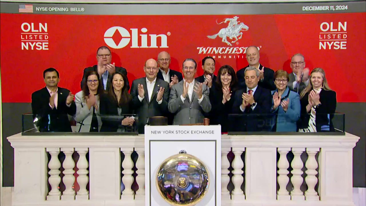 Ken Lane with Olin colleagues at the New York Stock Exchange opening-bell ceremony