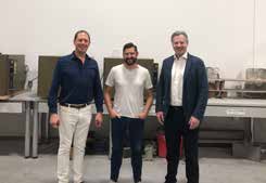 Ken MacKinnon with his CarbiCrete hosts at the company's Lachine facilities
