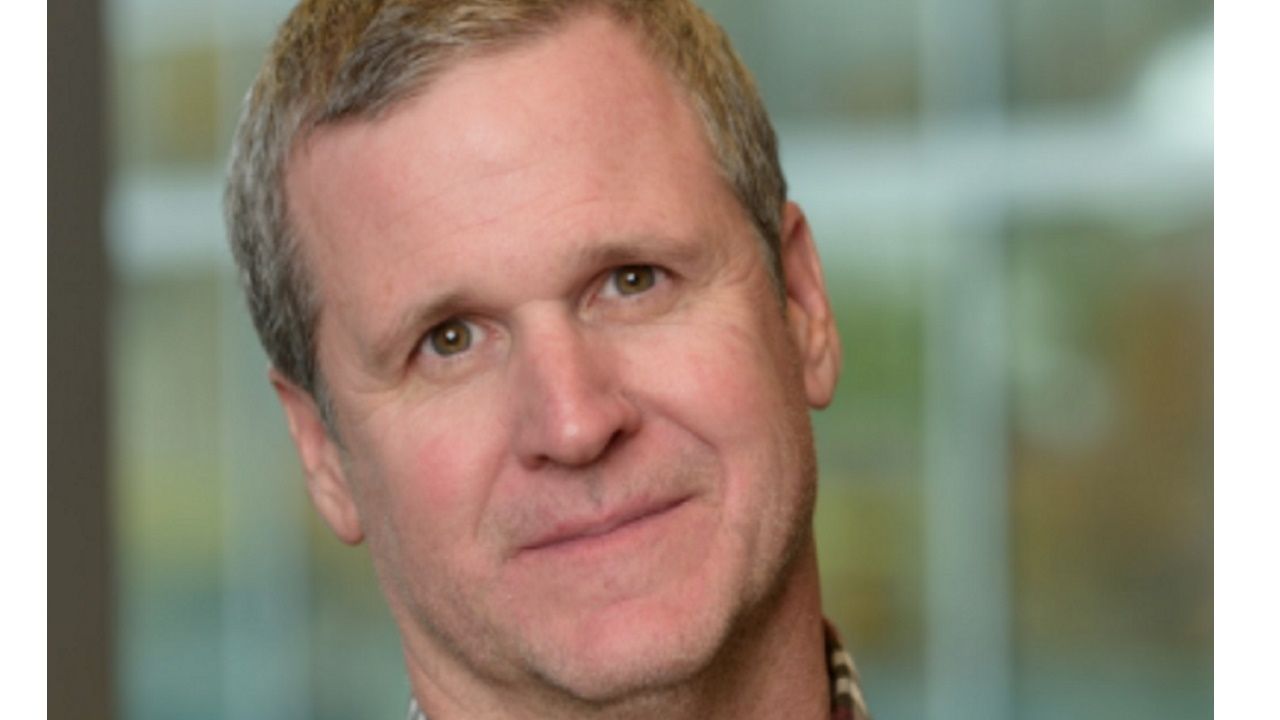 Ken Naumann in a professional press portrait from his NetWitness period