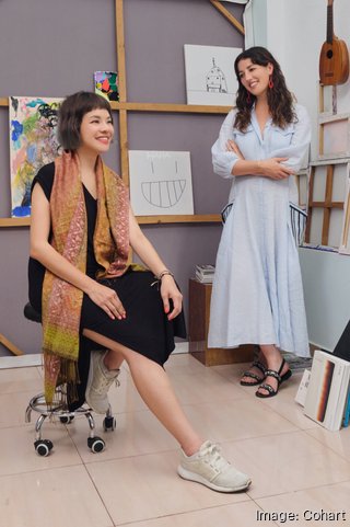 Kendall Warson and Cohart co-founder Shyevin S'ng in an art-filled workspace
