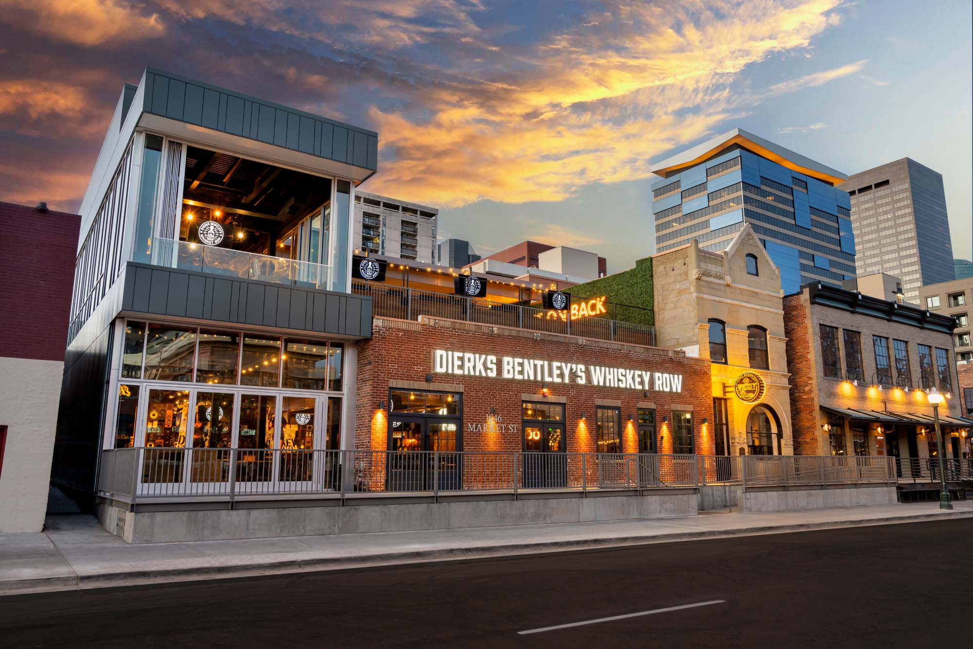 Dierks Bentley’s Whiskey Row on Market Street, with a rooftop terrace above the brick facade