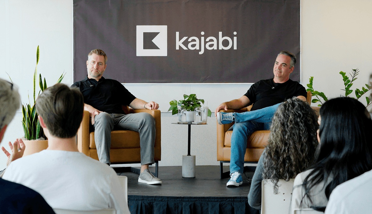 Kenny Rueter, left, and Jonathan Cronstedt seated in conversation with an audience at Kajabi