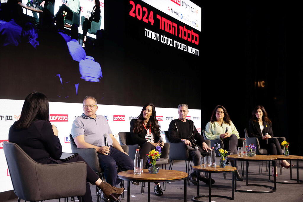 Keren Danziger, third from the left, seated with fellow fintech executives at the Economy of Tomorrow conference in 2024