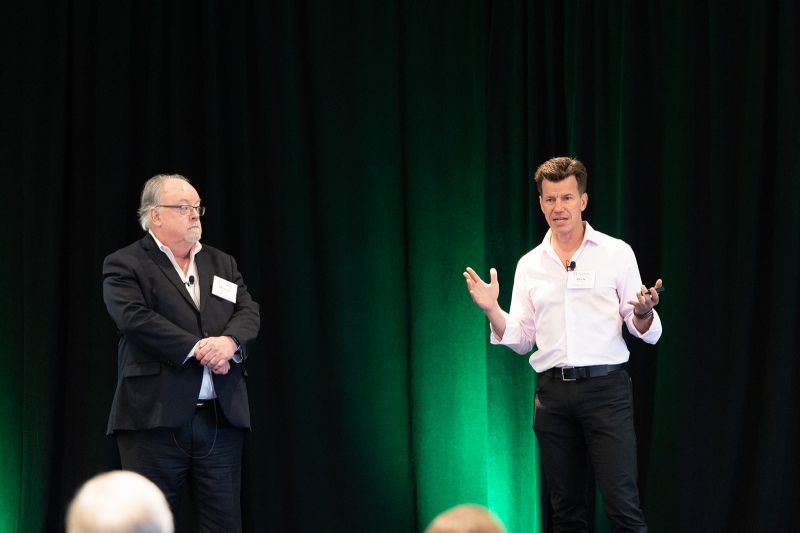Brendan Reidy and Kevin Frick speaking onstage at Serent Capital's CEO and Director Summit