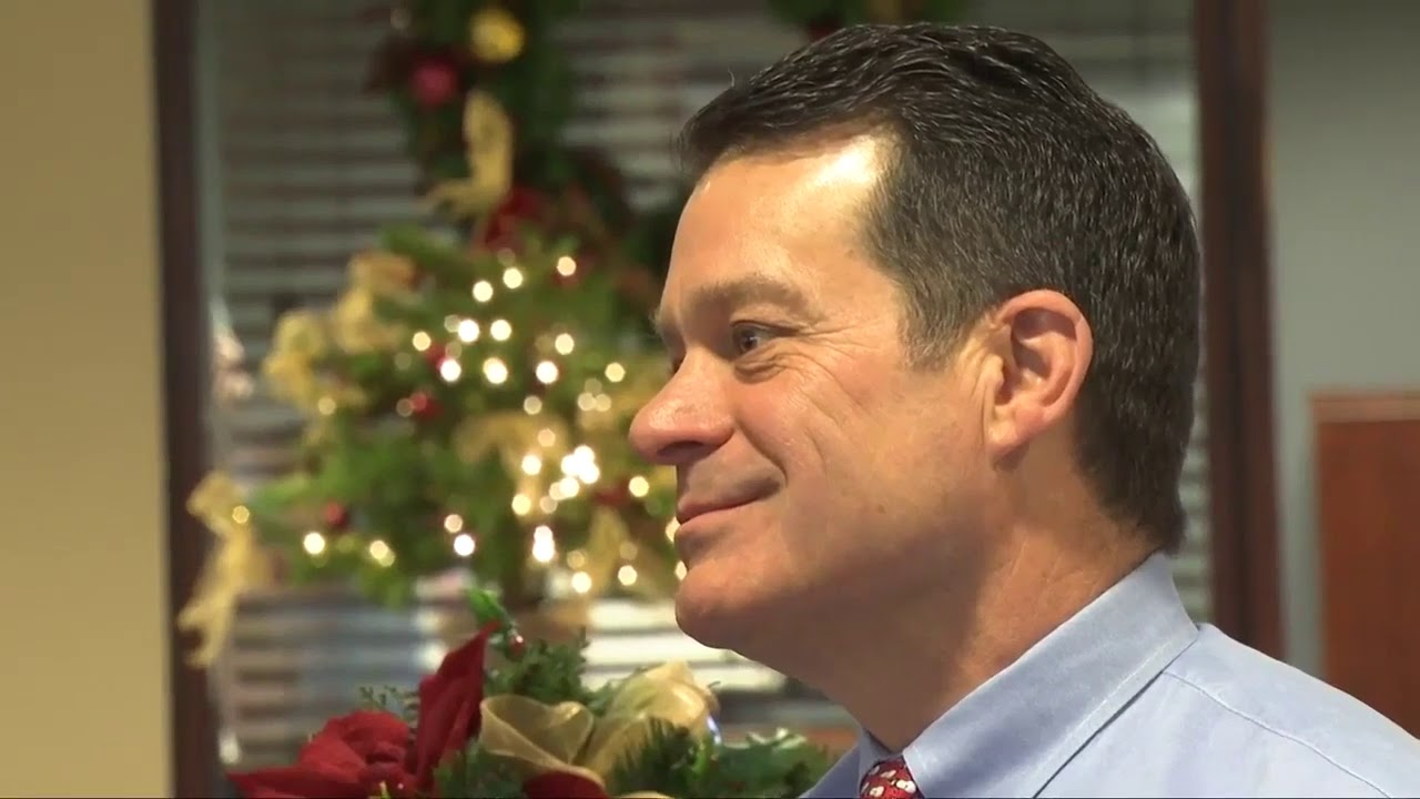 Kevin Riley speaking at the Billings bank during the December 2018 teller-line fundraising challenge