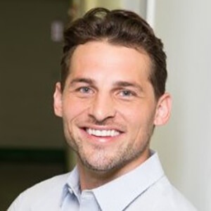 Kevin Sides smiling in the photograph accompanying Grow’s ShipMonk customer case study