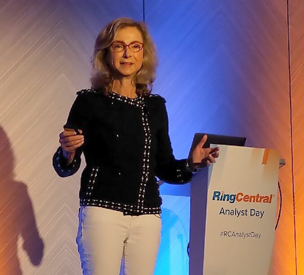 Kira Makagon speaking onstage at a RingCentral analyst event
