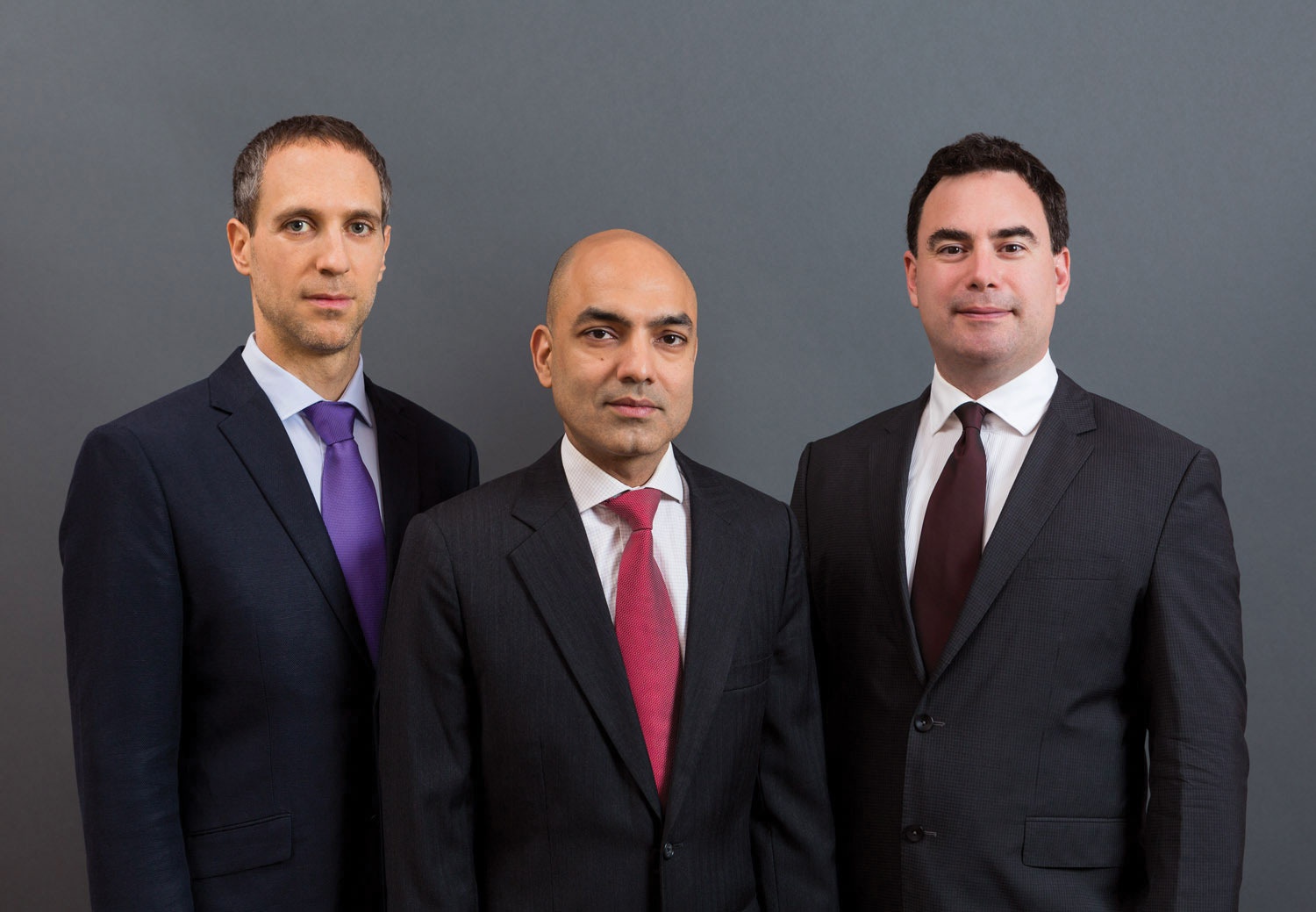 Michael Kirch, Kirat Singh and Mark Higgins standing together in a Beacon press photograph
