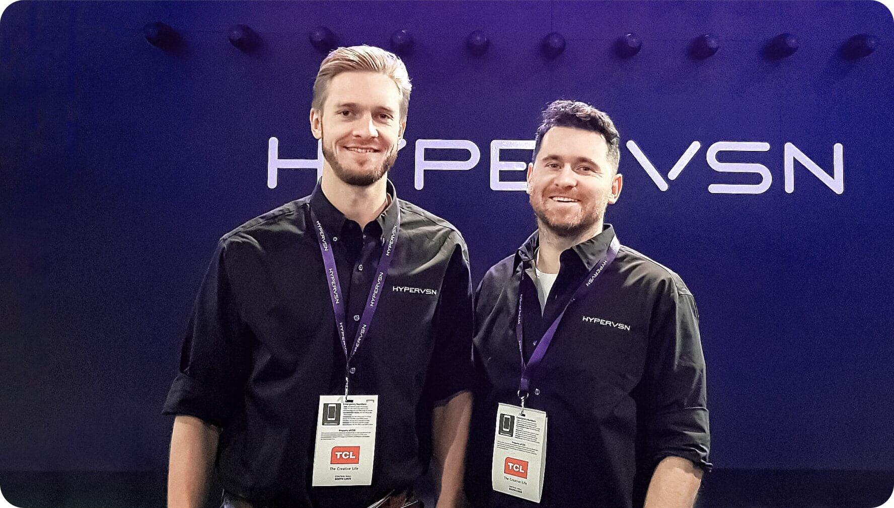 Kiryl Chykeyuk, left, and Art Stavenka together at a HYPERVSN exhibition stand