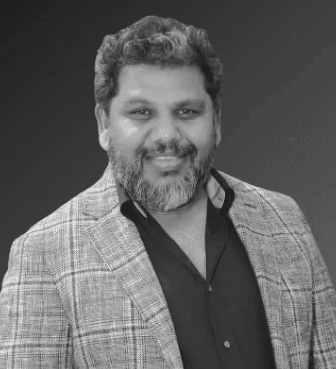 Kishore Pallamreddy Spent 18 Years Making Travel Software Behave. Now He Wants AI to Earn Its Boarding Pass.