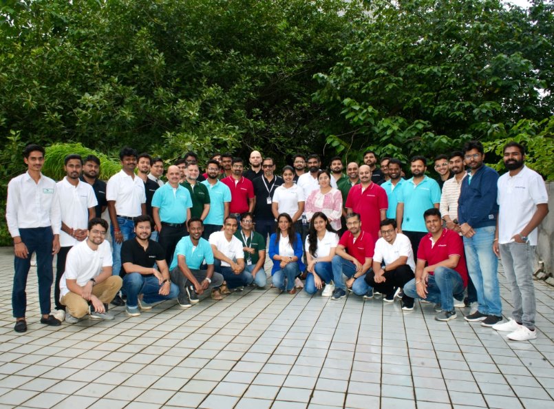 Facctum colleagues gathered outdoors for a team photograph