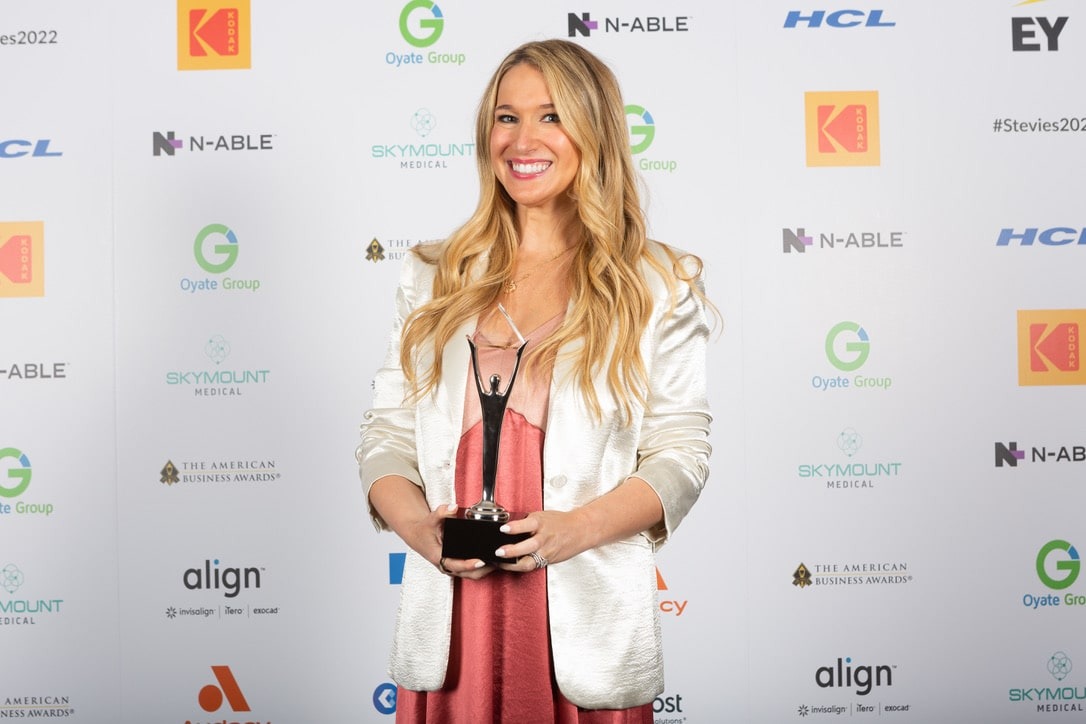 Kody Gurfein holding her Silver Stevie Award at the 2022 American Business Awards