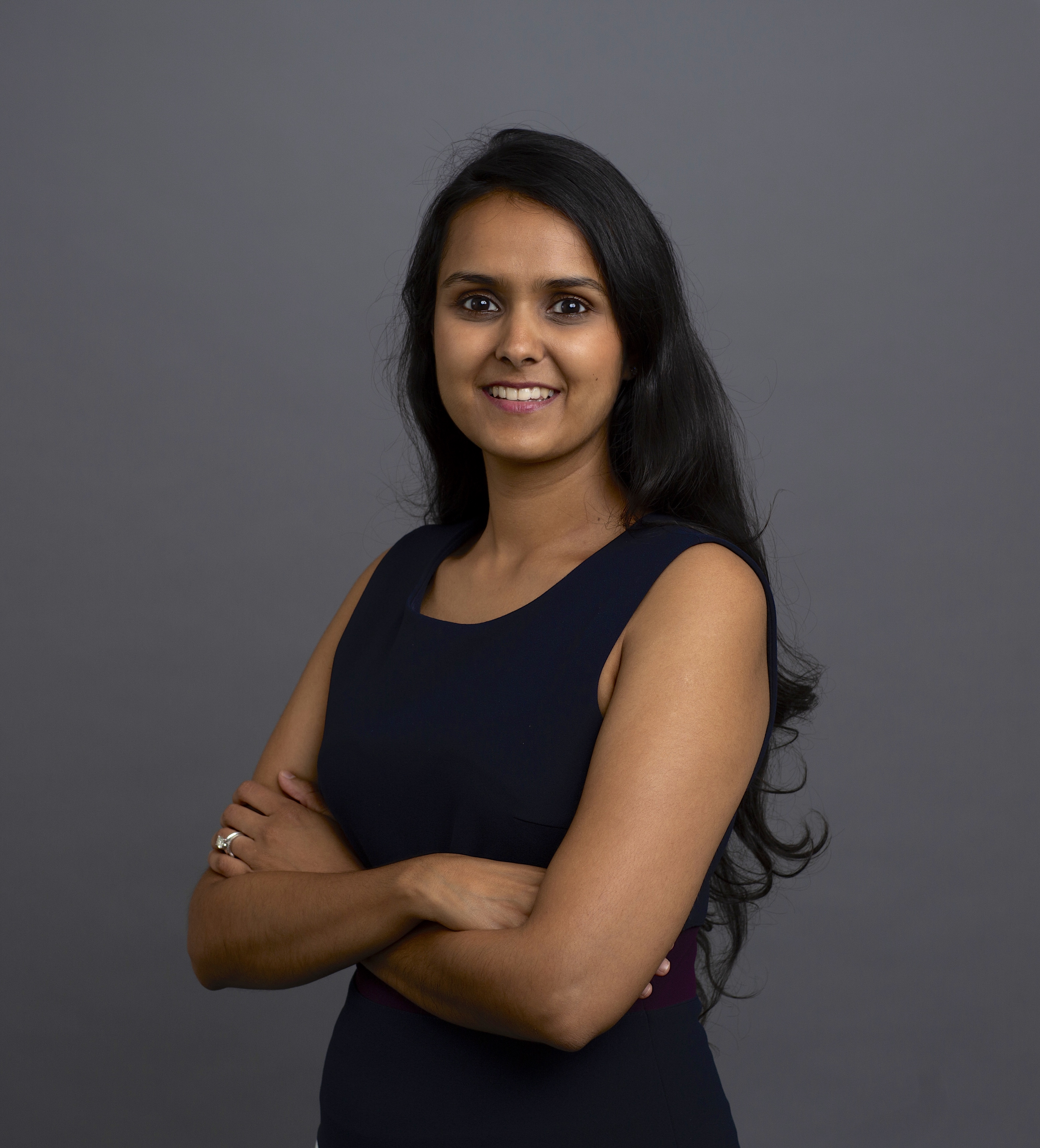 Komal Kothari standing with her arms folded, in a photograph published by Saanvi Ventures