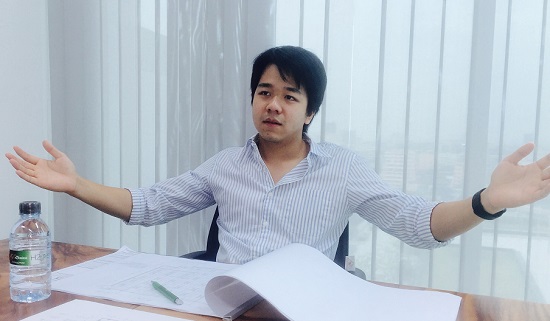 Korawad Chearavanont seated at a meeting table, gesturing with both arms during an early Eko interview