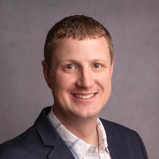 Portrait of Kris Poulson, CEO of FarmQA