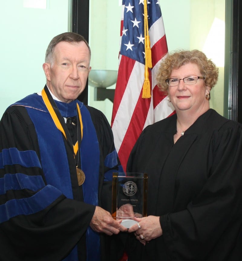 Kris Williams with West Liberty interim president John McCullough at the university’s 2015 commencement