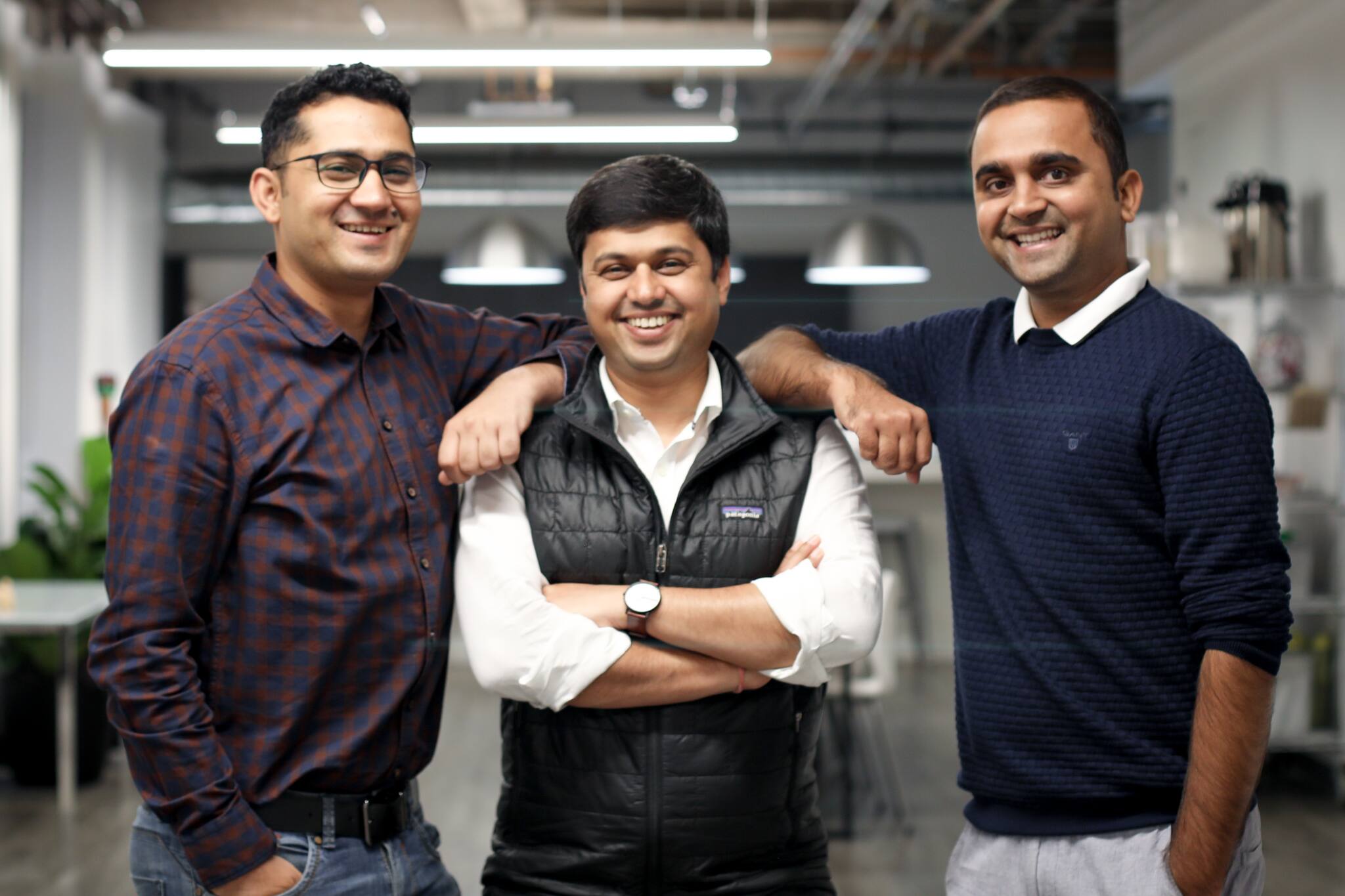 Nishant Mungali, Krishna Depura and Deepak Diwakar smiling together in an office