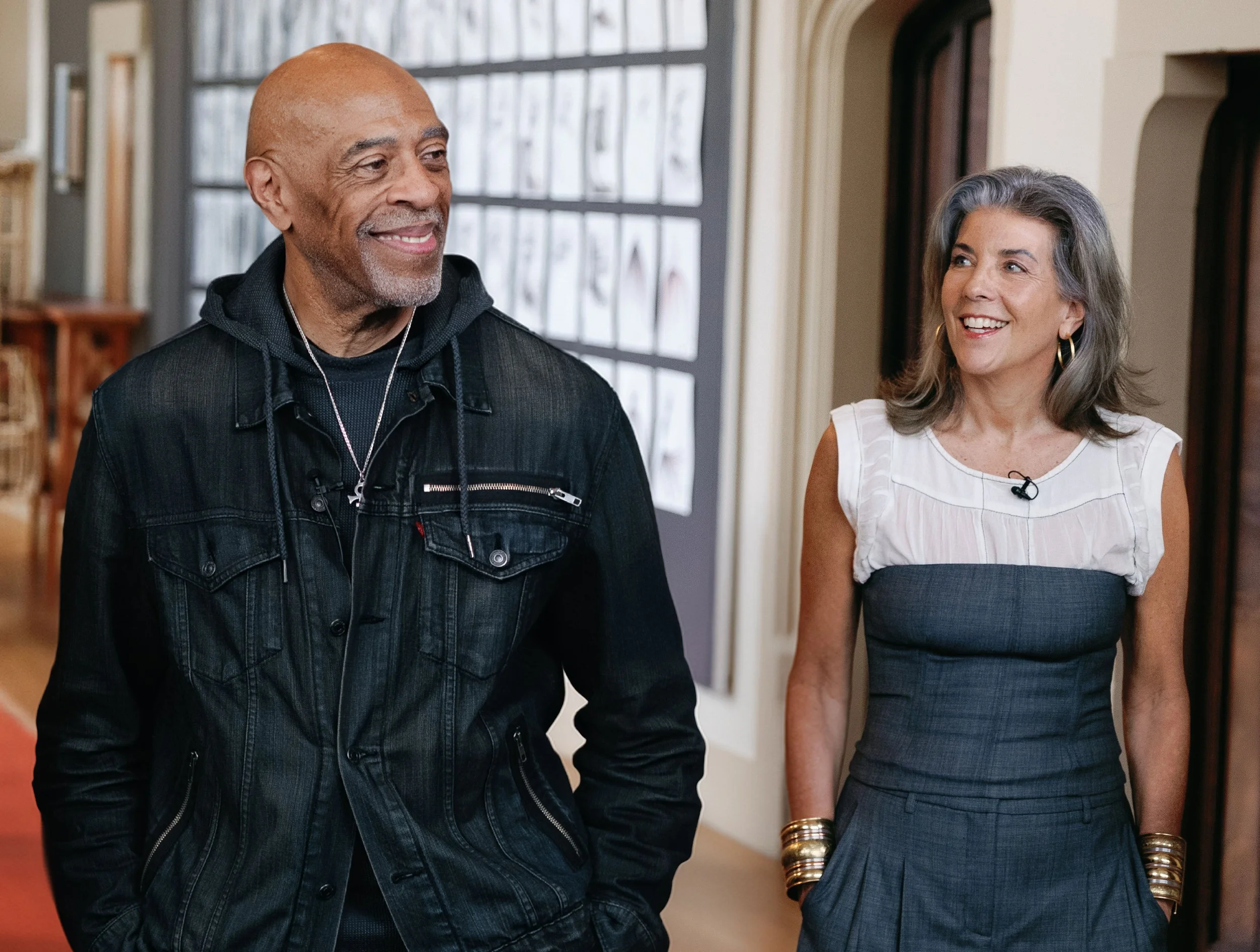 Danny Robinson and Kristen Cavallo smiling during an interview at the Branch Museum of Design
