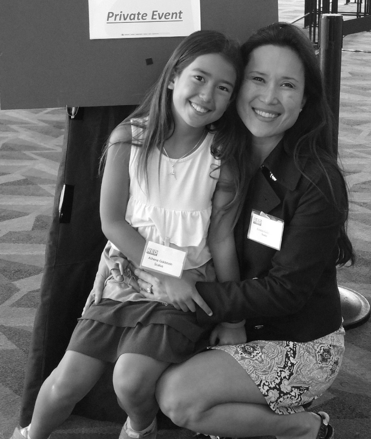 Kristen Koh Goldstein with her daughter Athena at a technology investor conference