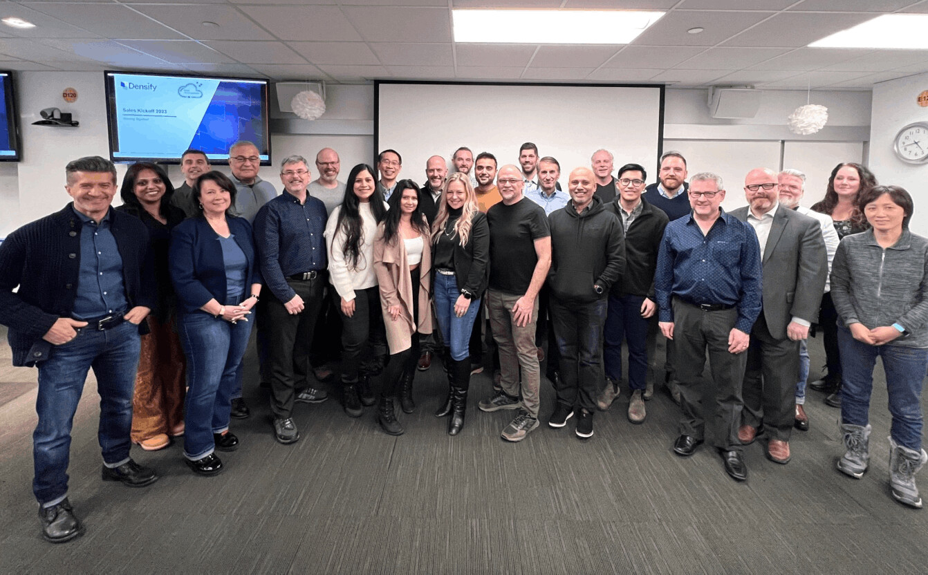 The Kubex team gathered in an office during its Densify era
