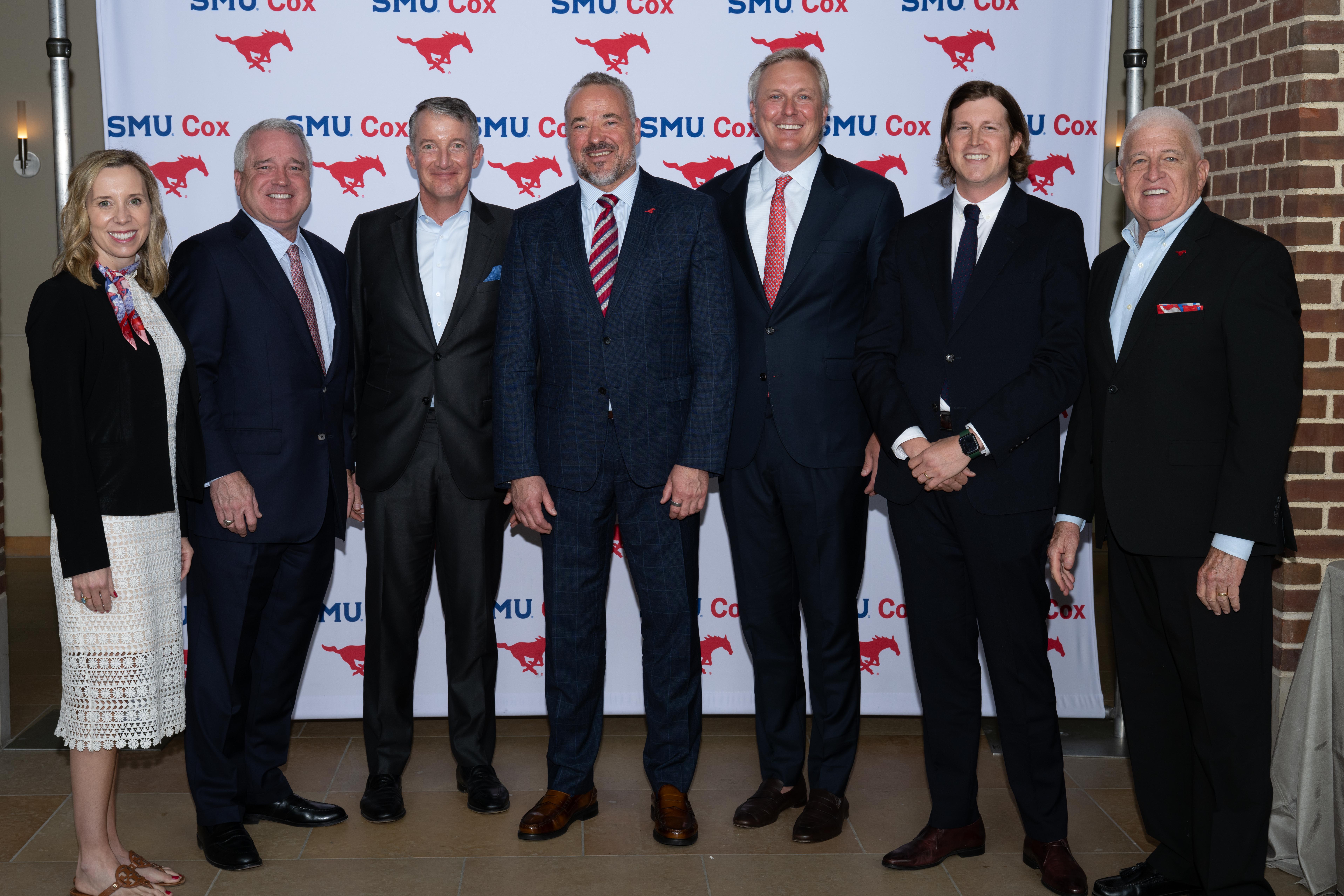Kyle Miller, third from right, with fellow honorees and SMU leaders at the 2026 Cox alumni awards