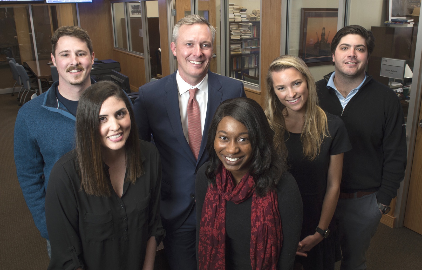 Kyle Miller, at the back center, with SMU students at the Maguire Energy Institute