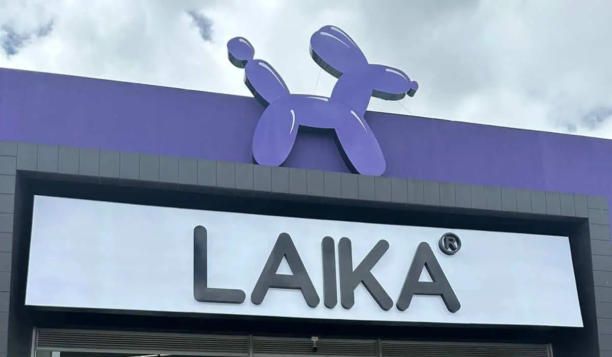 Exterior of a Laika pet store with a purple balloon-dog sign