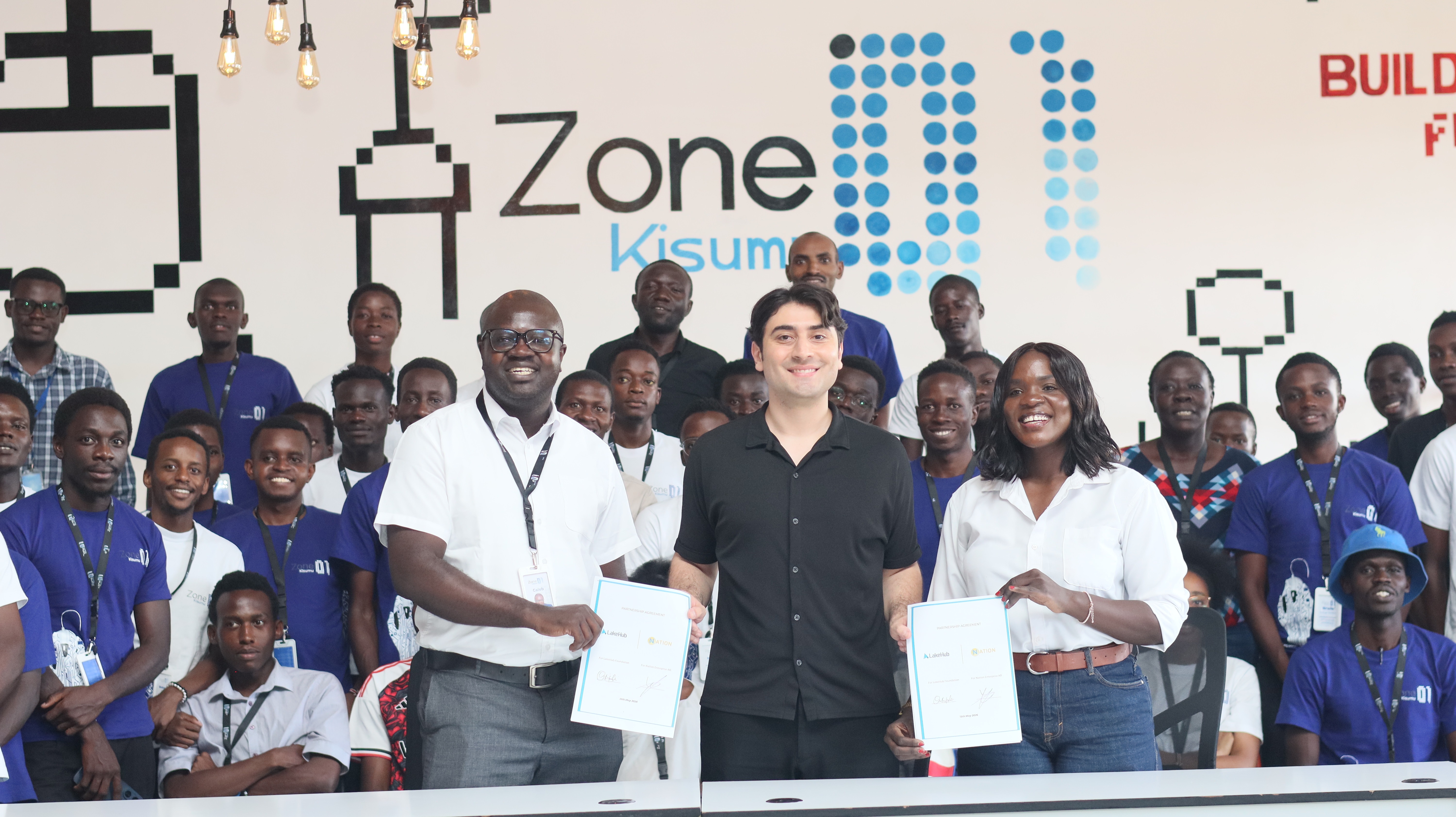 Zone01 Kisumu apprentices and representatives at the Nation.dev agreement signing