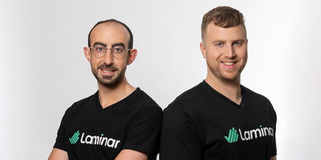 Laminar’s two co-founders wearing black Laminar shirts