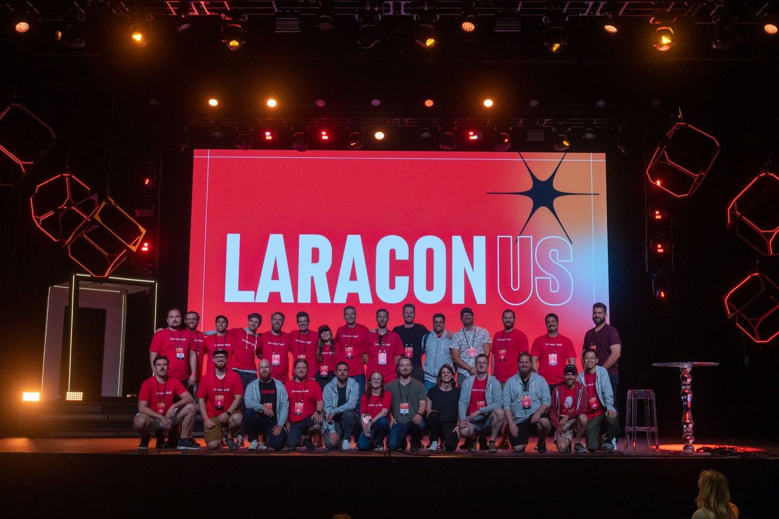 Laracon US participants gathered onstage for a group photograph
