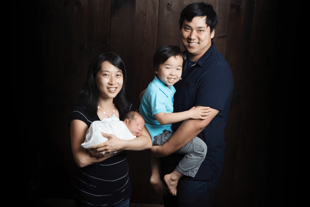 Larry Kim with his wife Kay Lee and their two children in a family photograph
