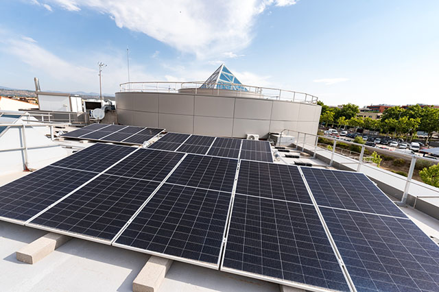 Photovoltaic panels installed on a municipal rooftop in Las Rozas