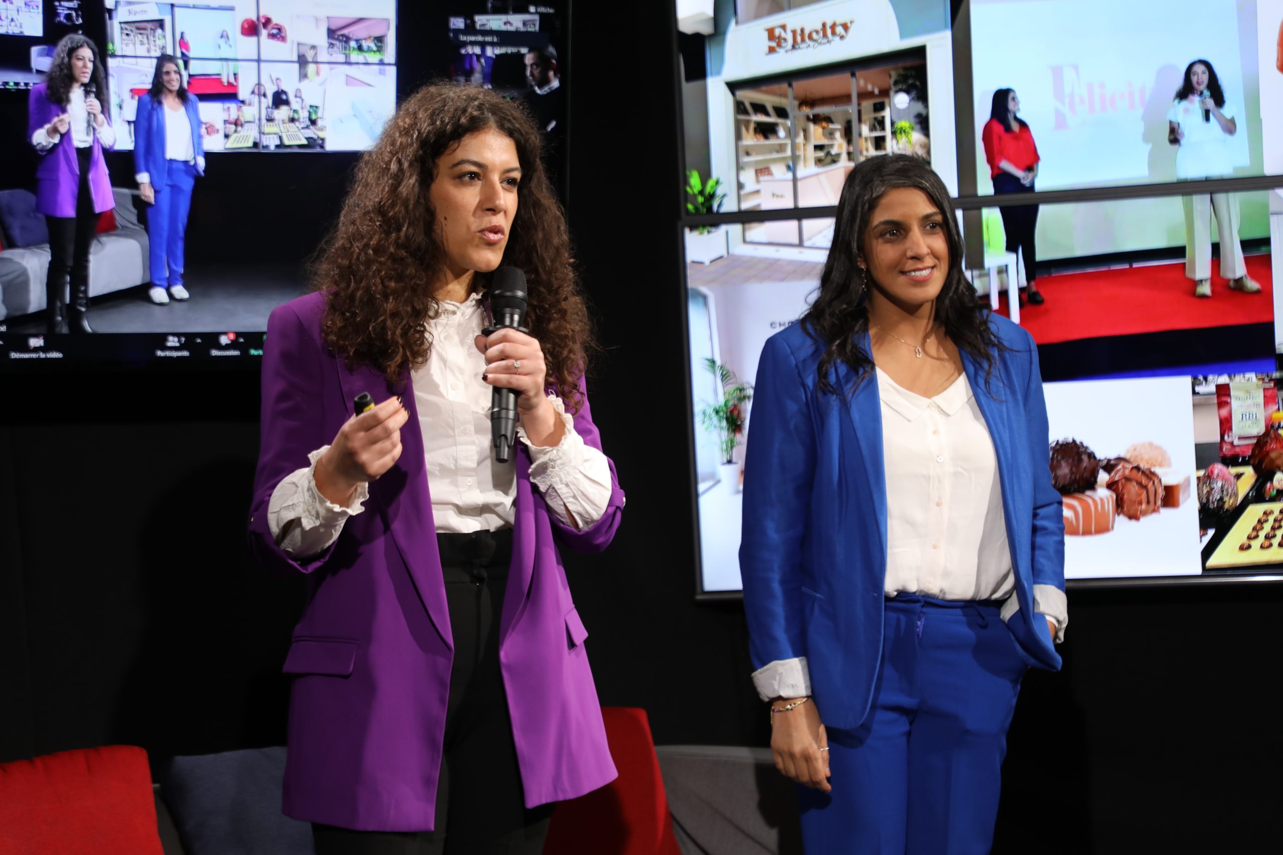 Two members of the Felicity team presenting their business at a Scalerator event
