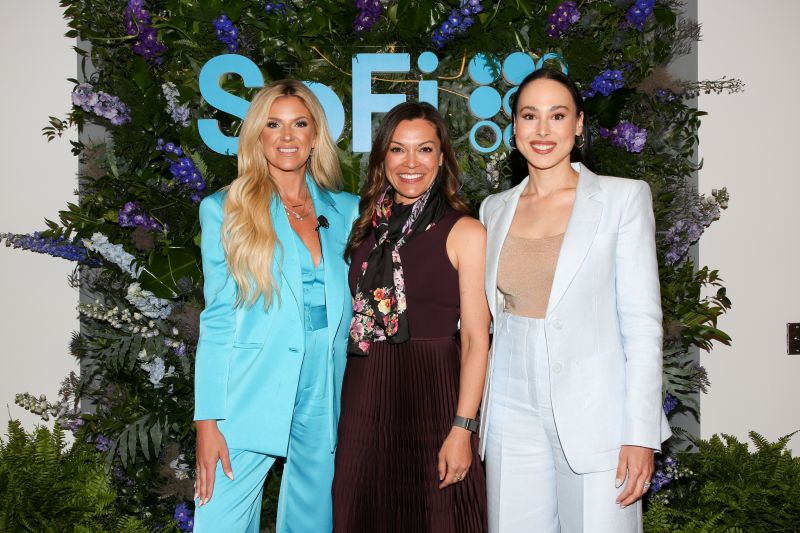 Lauren Stafford Webb, Liz Young Thomas and Meena Harris posing at a SoFi event